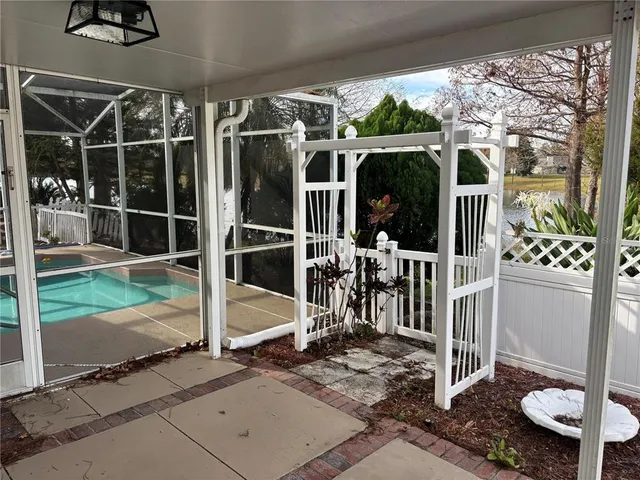 a view of a lake with a yard