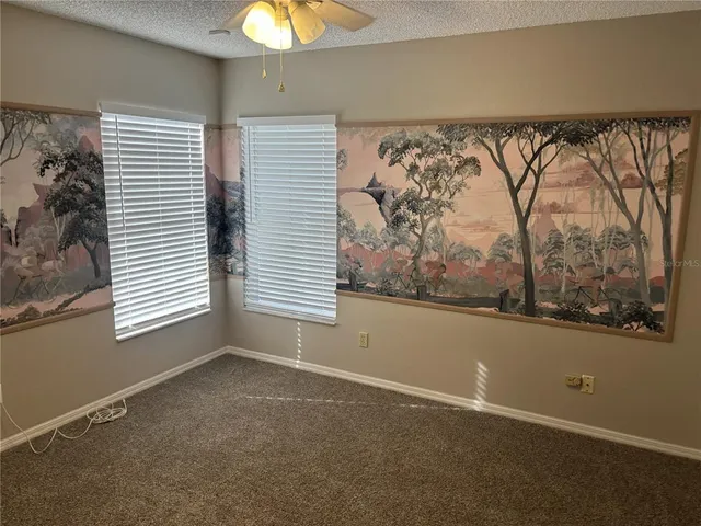 a view of a room with a large window