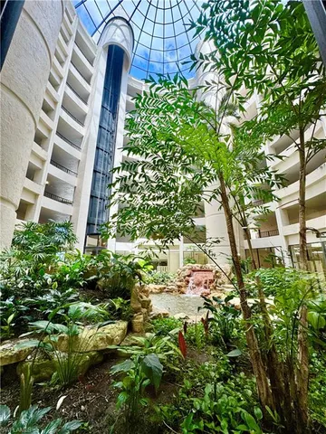 a view of backyard with potted plants