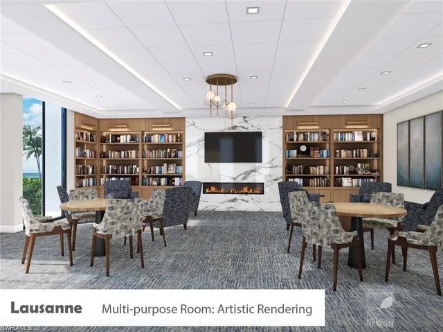 a living room with stainless steel appliances kitchen island granite countertop furniture and a kitchen view