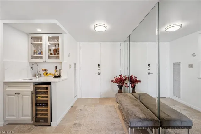 a view of hallway with cabinets