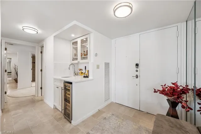a view of a livingroom with furniture and a window