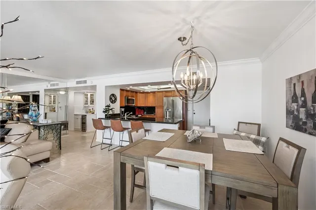 a kitchen with a stove a sink and a refrigerator