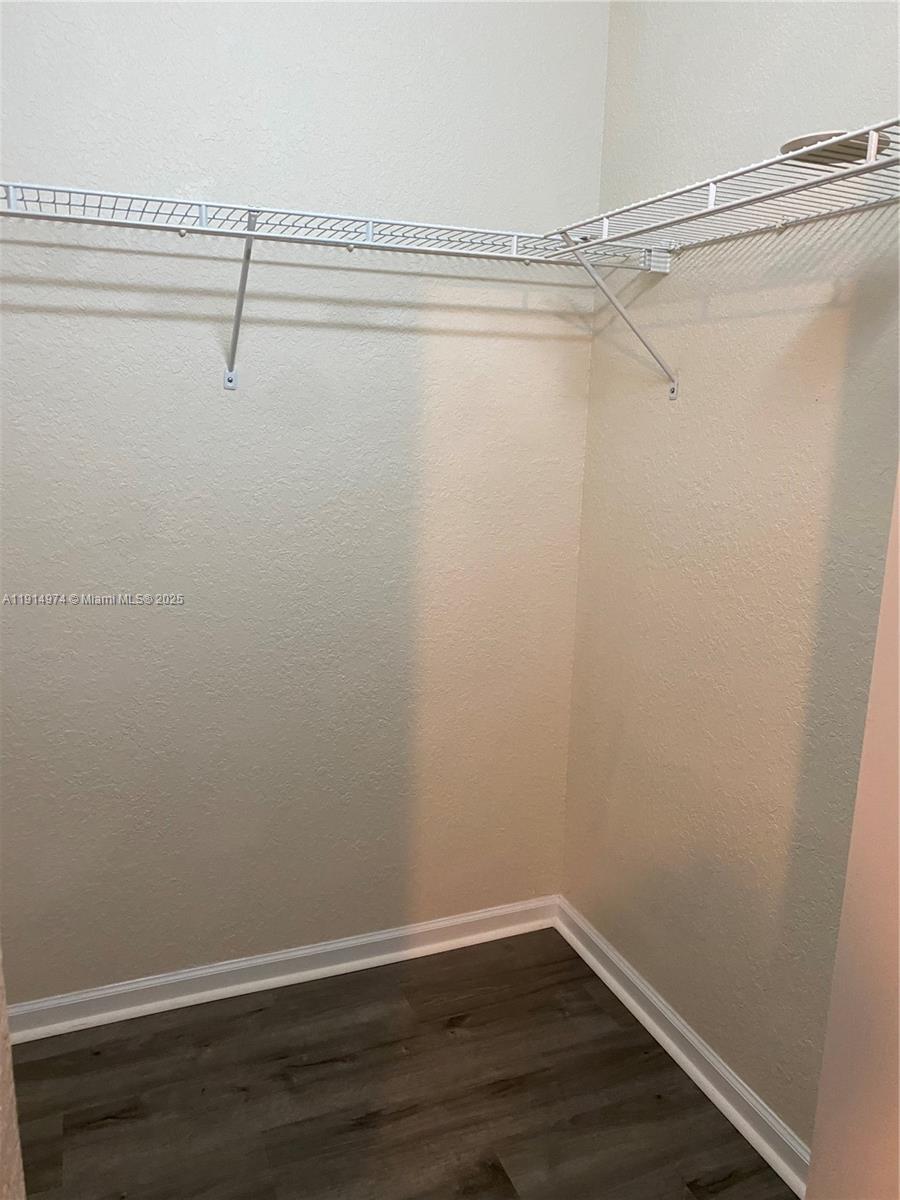 8395 Southwest 29th Street, Unit 102 Miramar, FL 33025 - Photo 15 of 20 a view of a room with racks on the wall