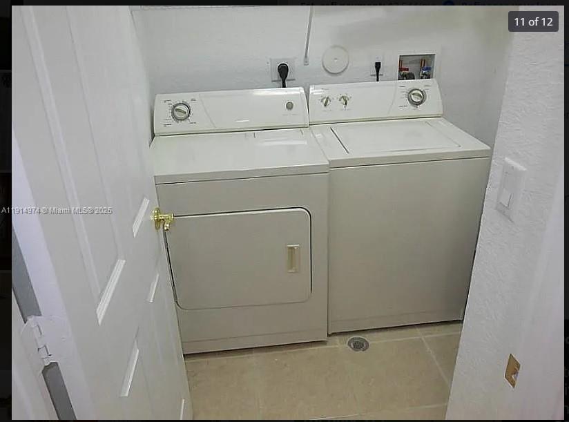 8395 Southwest 29th Street, Unit 102 Miramar, FL 33025 - Photo 4 of 20 a utility room with dryer and washer