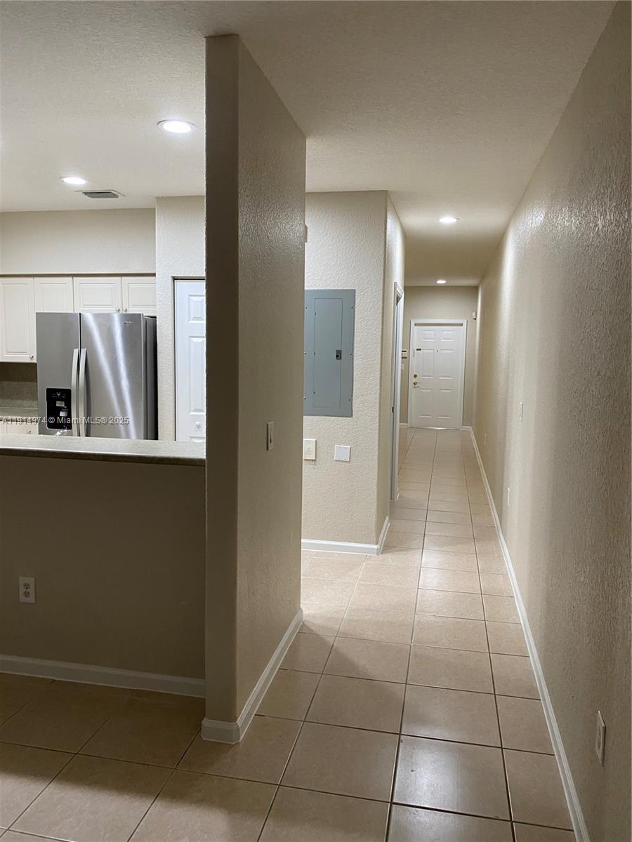 8395 Southwest 29th Street, Unit 102 Miramar, FL 33025 - Photo 5 of 20 a view of a hallway