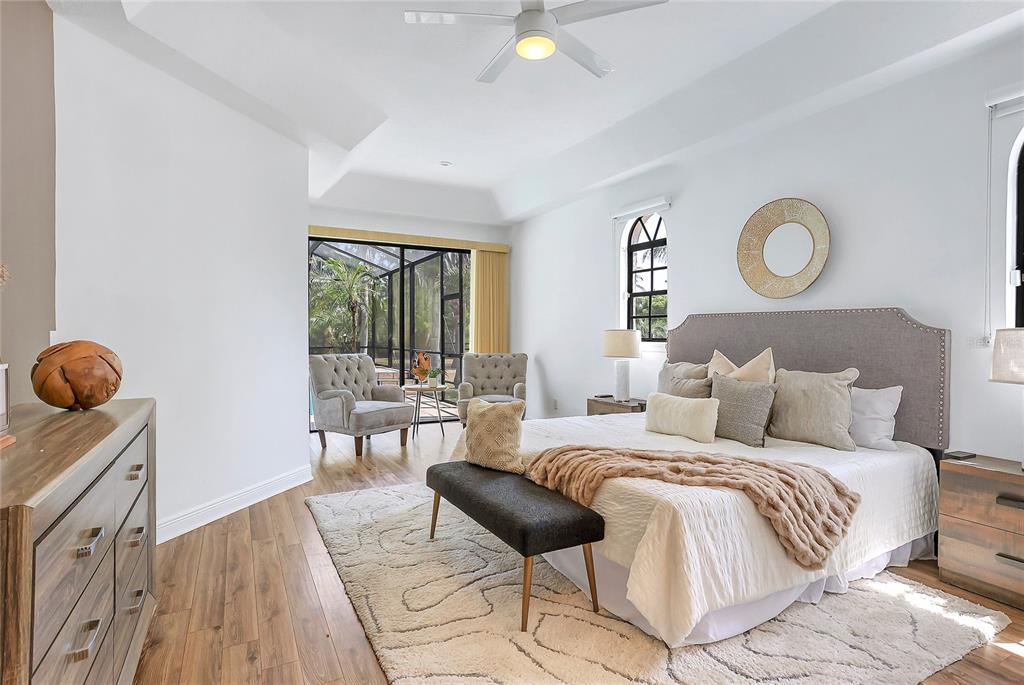 13124 Filly Court Windermere, FL 34786 - Photo 17 of 50 a bed room with a bed and a chair