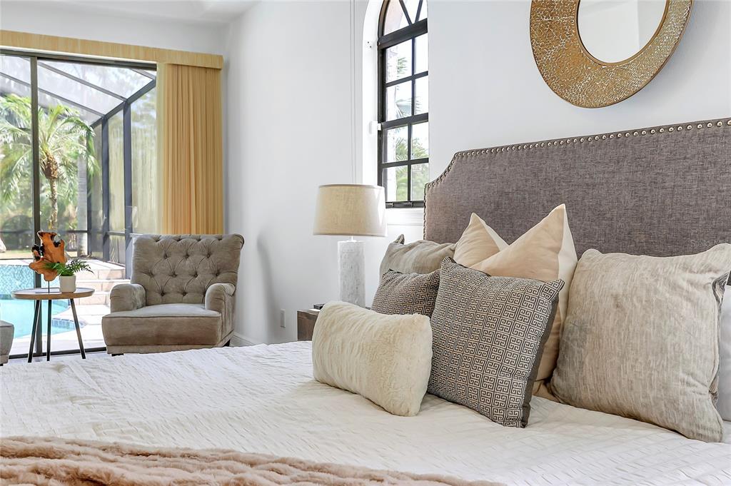 13124 Filly Court Windermere, FL 34786 - Photo 25 of 50 a living room with furniture a large window and a potted plant