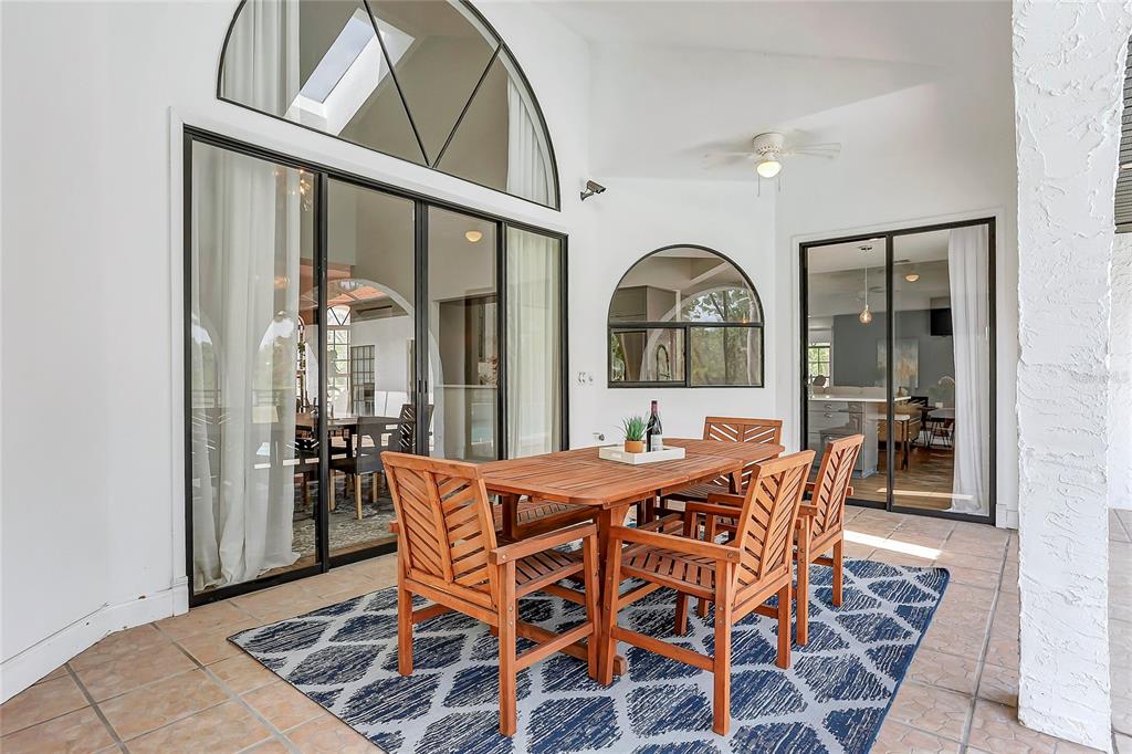 13124 Filly Court Windermere, FL 34786 - Photo 35 of 50 a view of a dining room with furniture and window