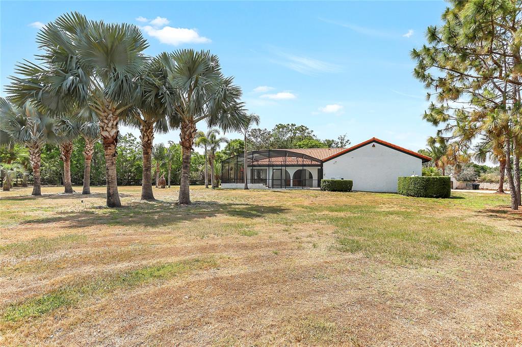 13124 Filly Court Windermere, FL 34786 - Photo 39 of 50 a front view of house with yard and green space