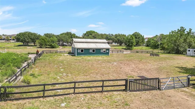 a view of a lake with a big yard