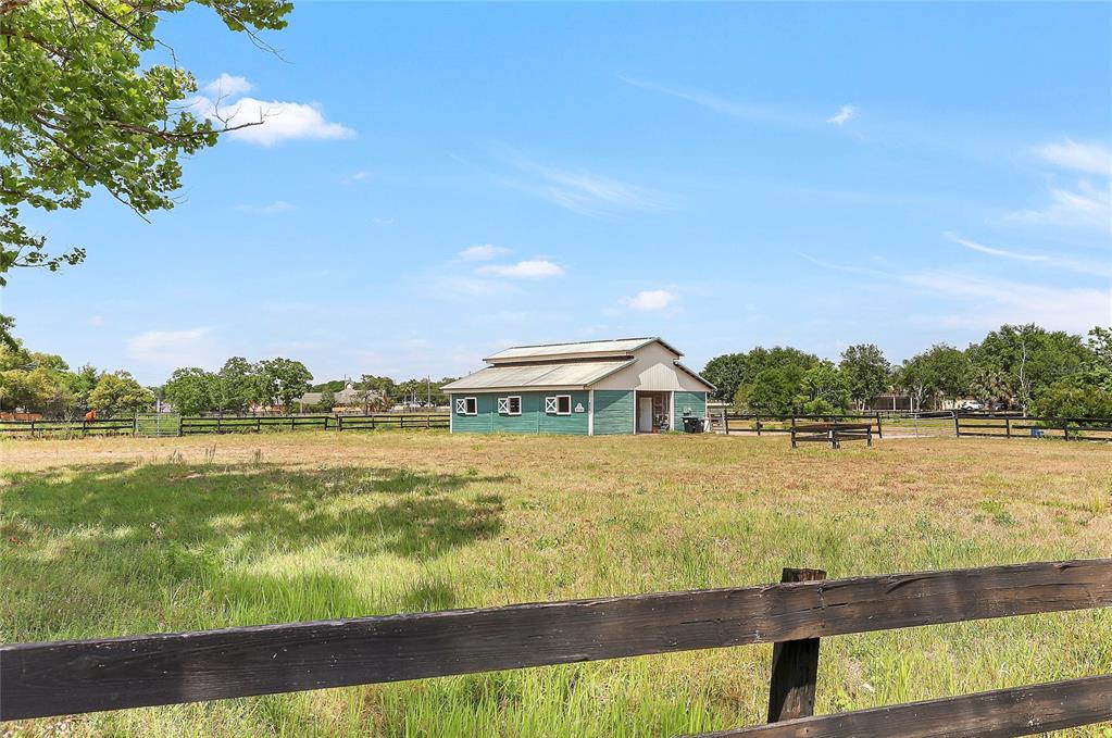 13124 Filly Court Windermere, FL 34786 - Photo 50 of 50 a view of a lake with a big yard