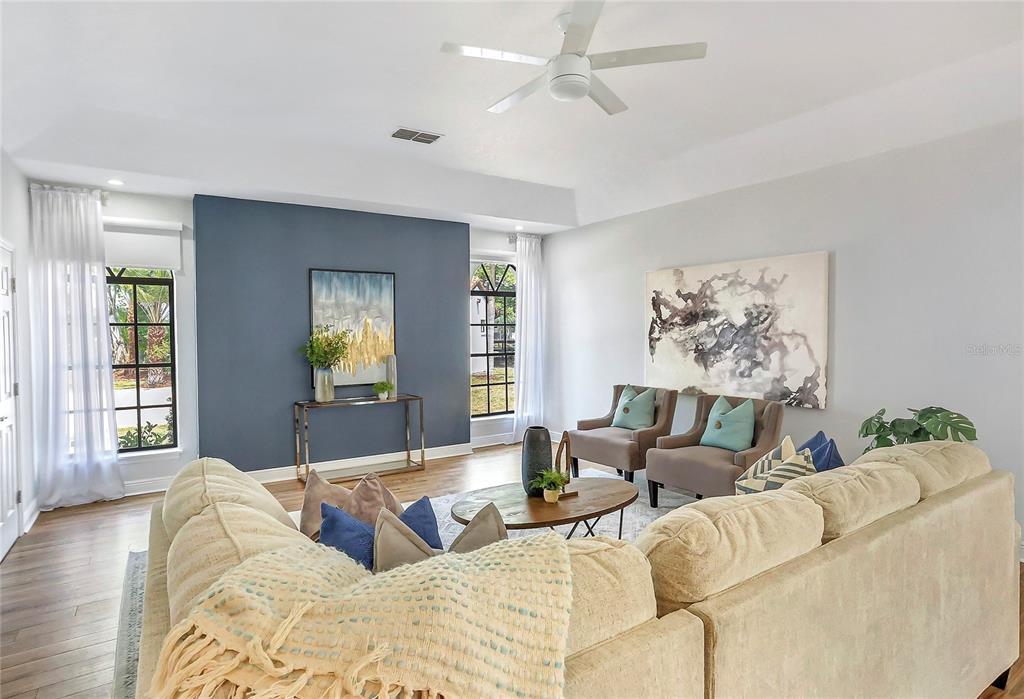 13124 Filly Court Windermere, FL 34786 - Photo 7 of 50 a living room with furniture and a large window