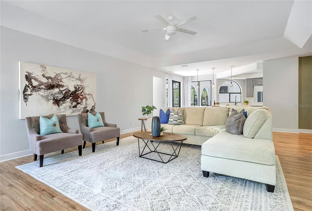 13124 Filly Court Windermere, FL 34786 - Photo 8 of 50 a living room with furniture and wooden floor