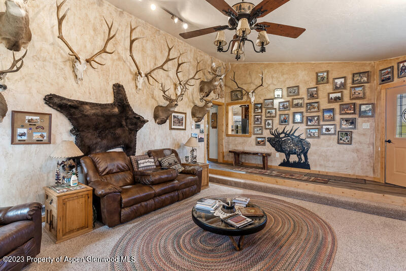 334 County Road 178 Craig, CO 81625 - Photo 13 of 19 a living room with furniture and a fireplace