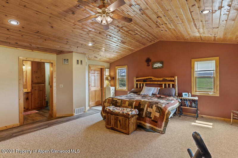 334 County Road 178 Craig, CO 81625 - Photo 15 of 19 a bedroom with a bed couch and window