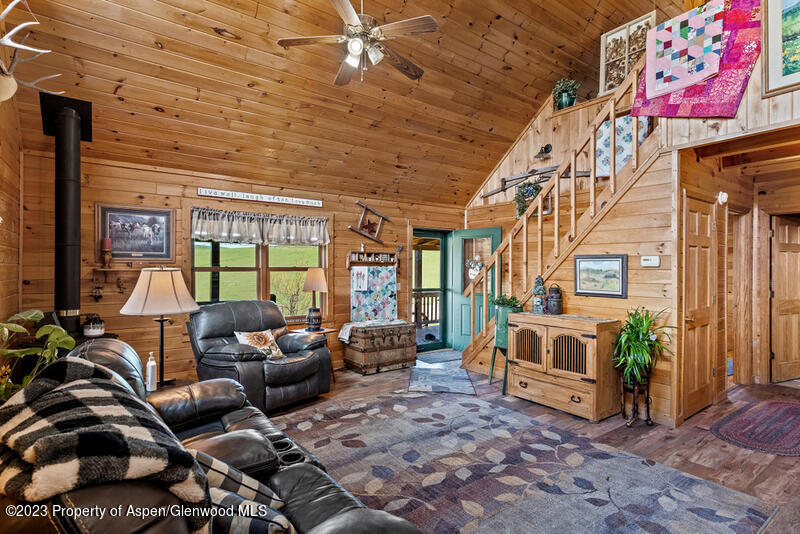 334 County Road 178 Craig, CO 81625 - Photo 5 of 19 a living room with furniture and a fireplace