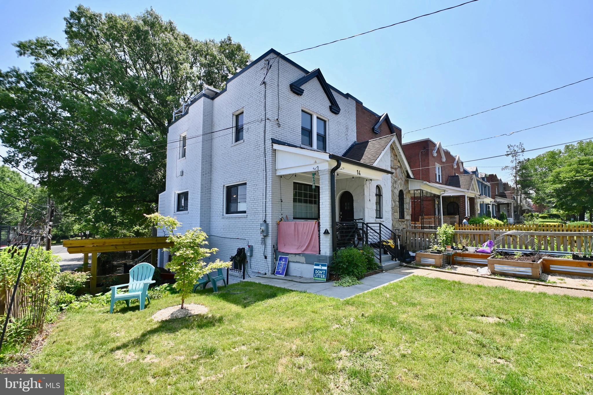14 53rd Street Southeast Washington, DC 20019 - Photo 2 of 46 a front view of house with yard and outdoor seating