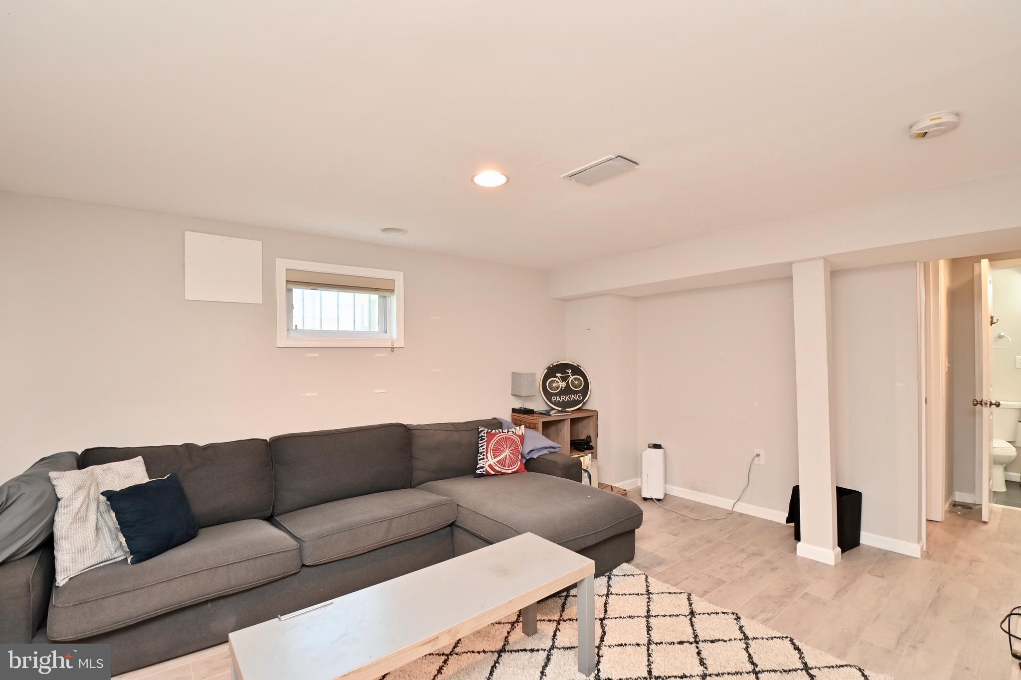 14 53rd Street Southeast Washington, DC 20019 - Photo 38 of 46 a living room with furniture and a window