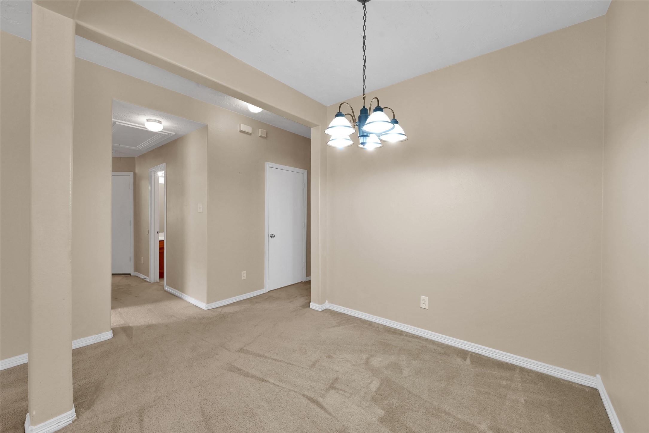 5046 Willow Point Drive Conroe, TX 77303 - Photo 16 of 44 a view of a chandelier in big room and a mirror