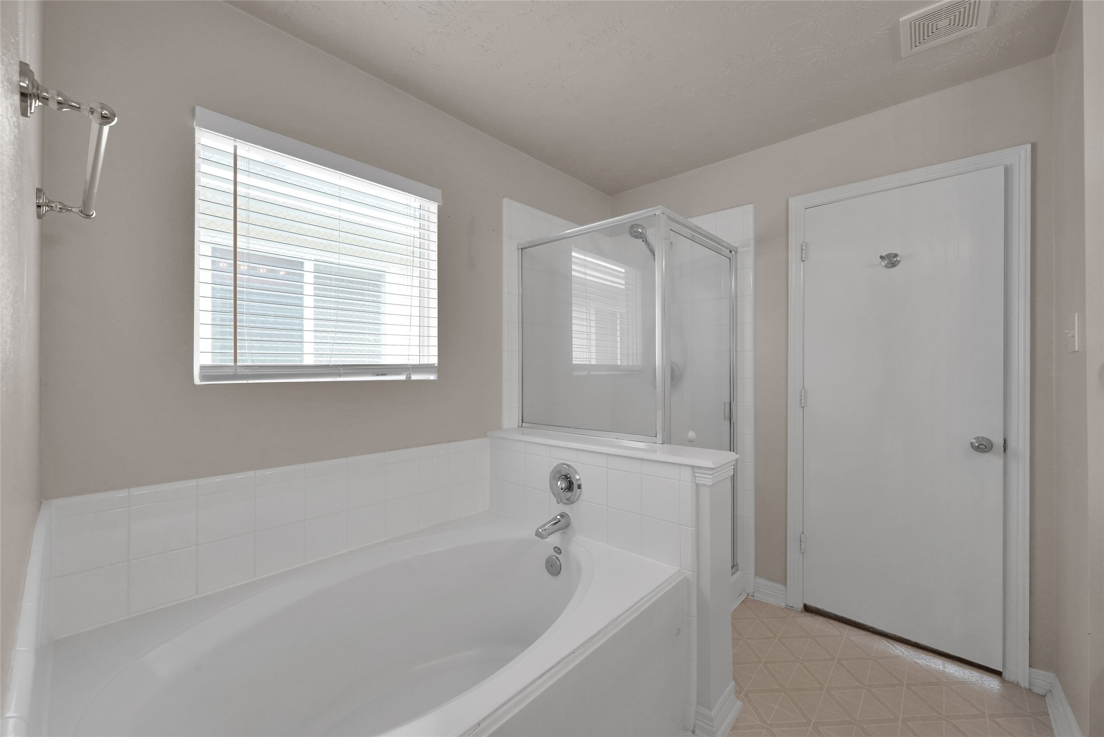 5046 Willow Point Drive Conroe, TX 77303 - Photo 25 of 44 a white bath tub sitting next to a window