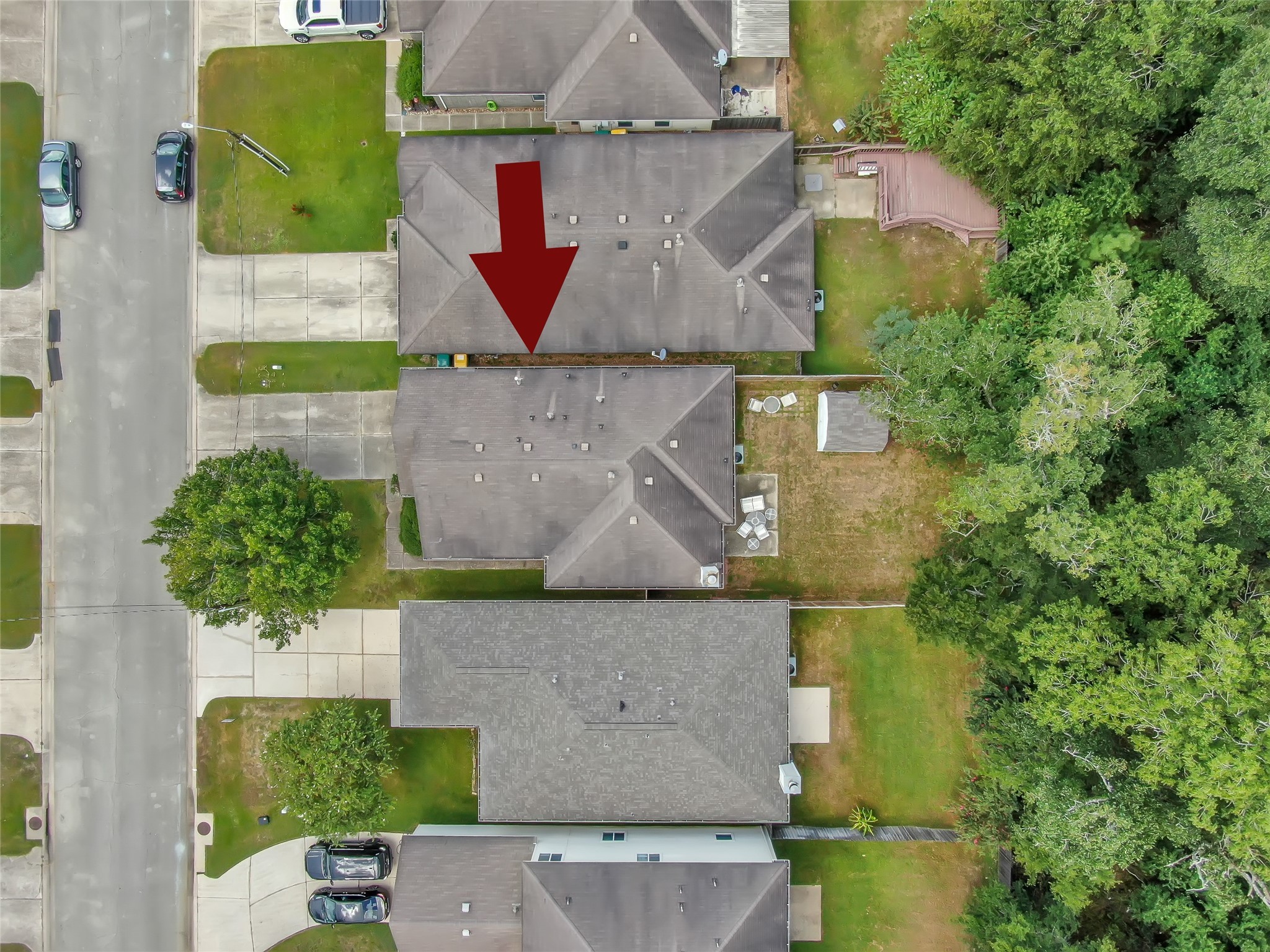 5046 Willow Point Drive Conroe, TX 77303 - Photo 42 of 44 an aerial view of a house with a yard