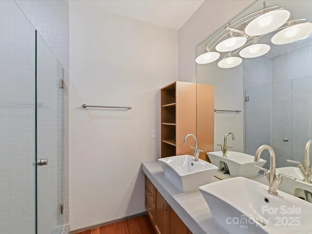 a bathroom with a shower and a toilet
