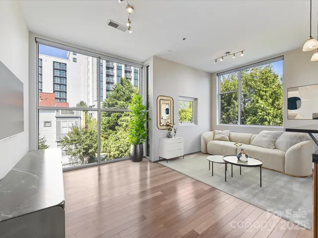 a view of kitchen with cabinets and wooden floor