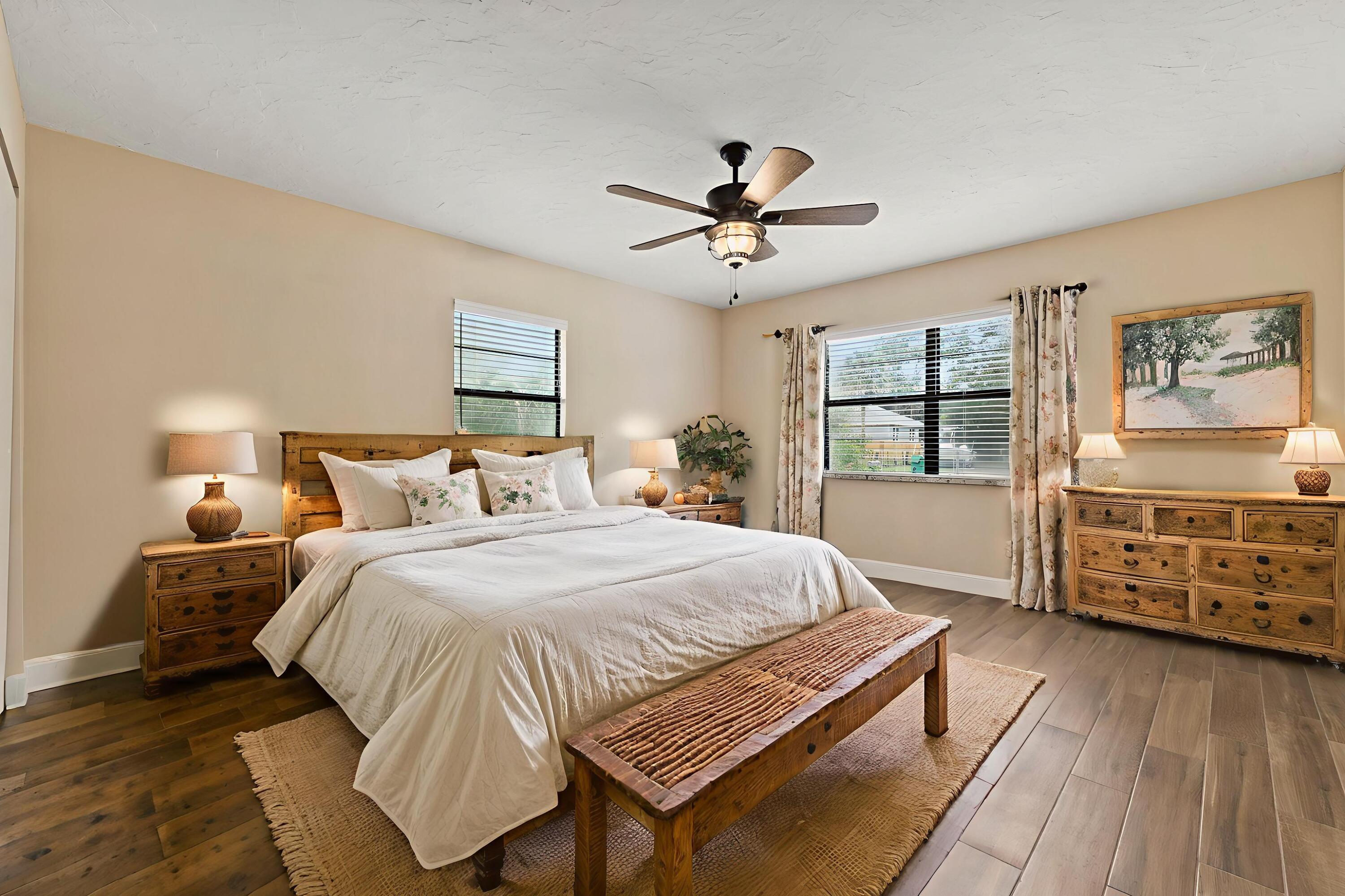 3585 Southeast 8th Street Okeechobee, FL 34974 - Photo 23 of 39 a bed room with a bed and a window