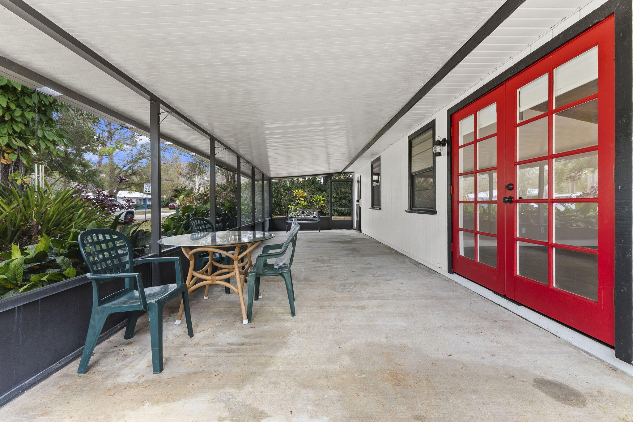 3585 Southeast 8th Street Okeechobee, FL 34974 - Photo 29 of 39 a dining room with furniture and a window