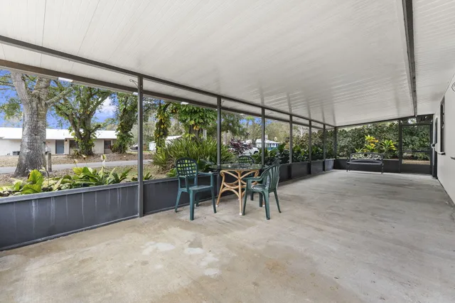 a view of outdoor space with furniture