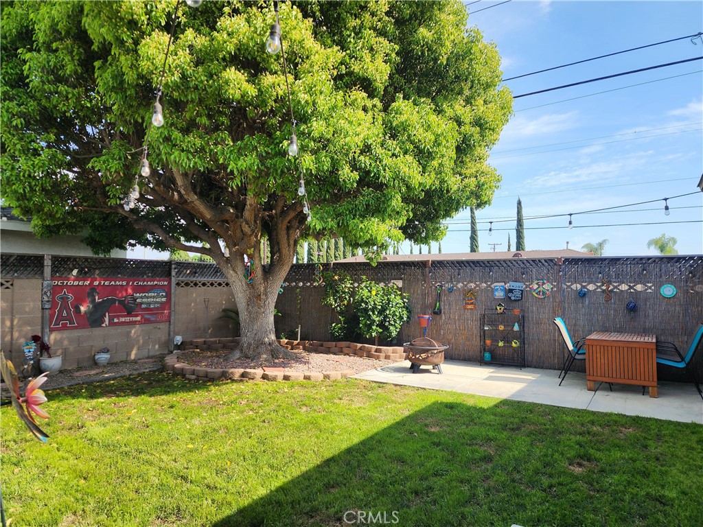 7450 Thunderbird Lane Stanton, CA 90680 - Photo 26 of 31 a front view of a house with a yard