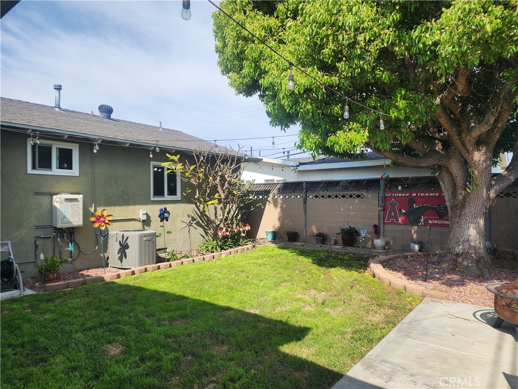 7450 Thunderbird Lane Stanton, CA 90680 - Photo 27 of 31 a view of a house with back yard