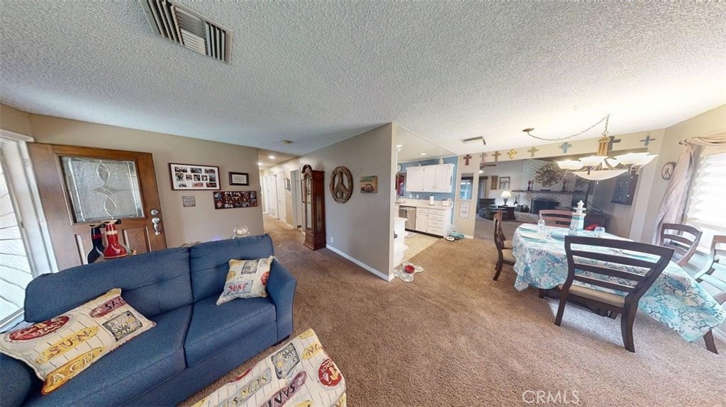 7450 Thunderbird Lane Stanton, CA 90680 - Photo 4 of 31 a living room with furniture and a wooden floor