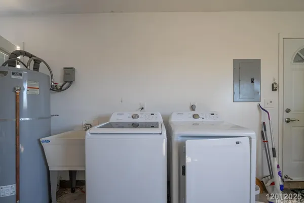 a utility room with dryer and washer