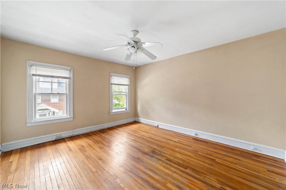 3076 Yorkshire Road Cleveland, OH 44118 - Photo 39 of 47 Spare room with light wood-type flooring and ceiling fan