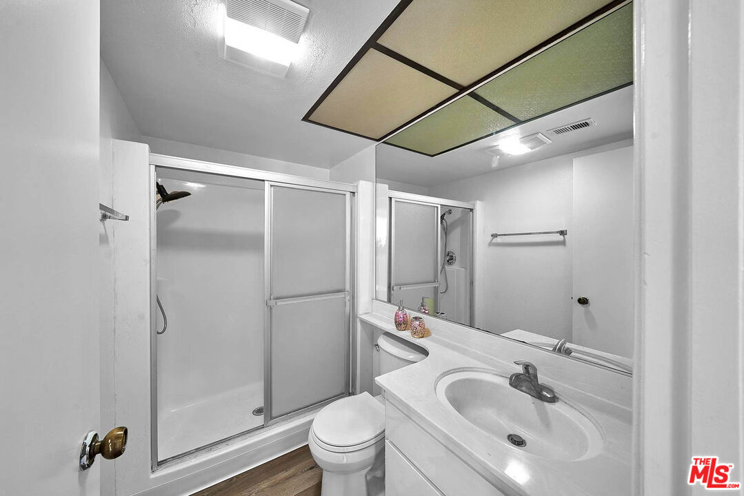 1333 Valley View Road, Unit 25 Glendale, CA 91202 - Photo 22 of 27 a bathroom with a sink toilet and shower