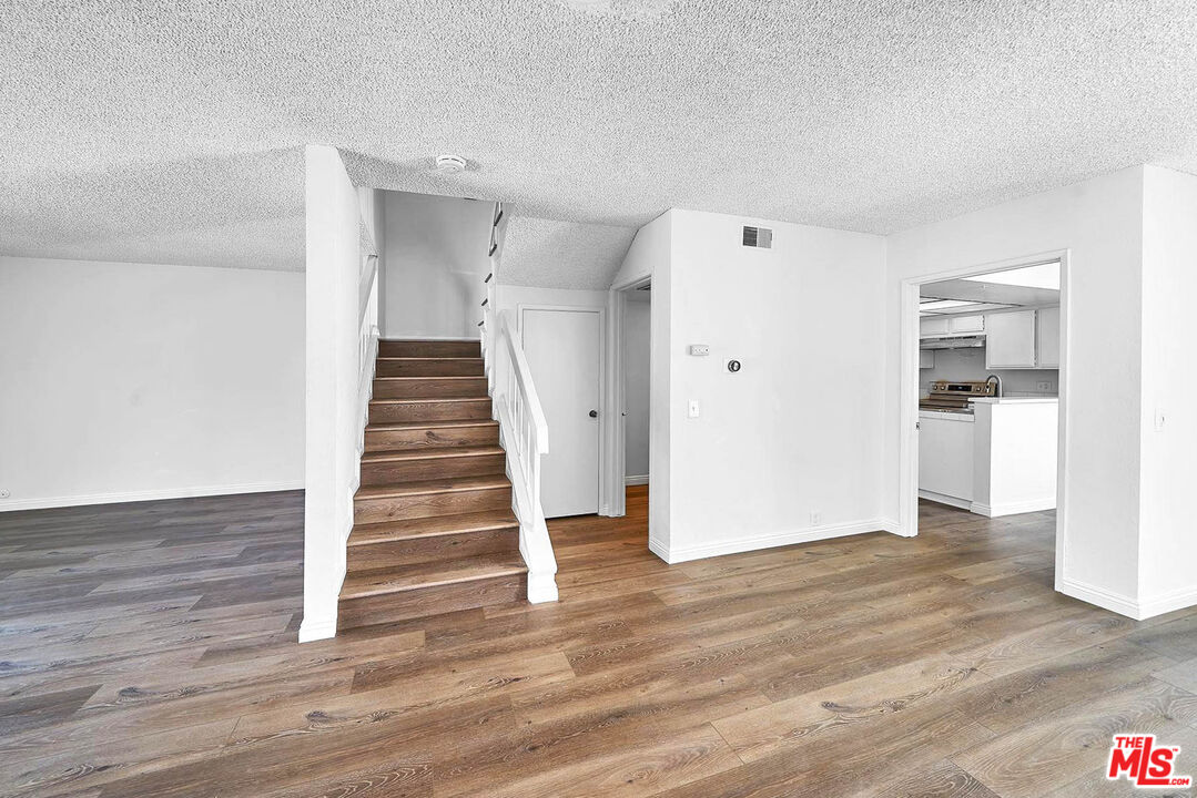 1333 Valley View Road, Unit 25 Glendale, CA 91202 - Photo 9 of 27 a view of entryway with wooden floor