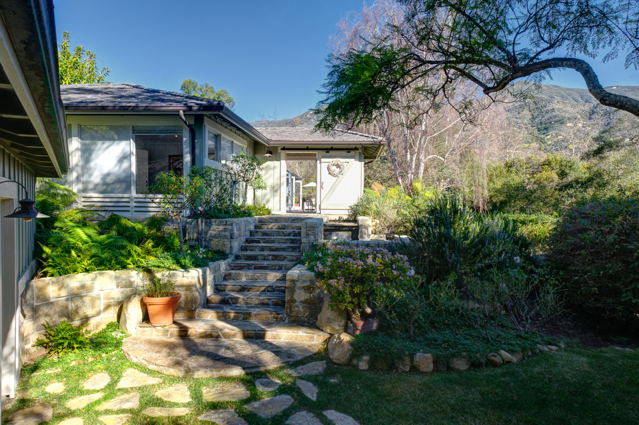 765 Ashley Road Montecito, CA 93108 - Photo 2 of 19 a front view of a house with a yard