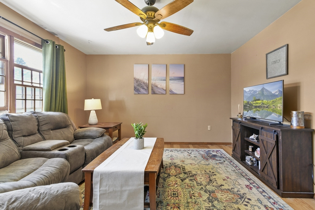 29 Murphy Place Pittsfield, MA 01201 - Photo 11 of 26 a living room with furniture and a flat screen tv