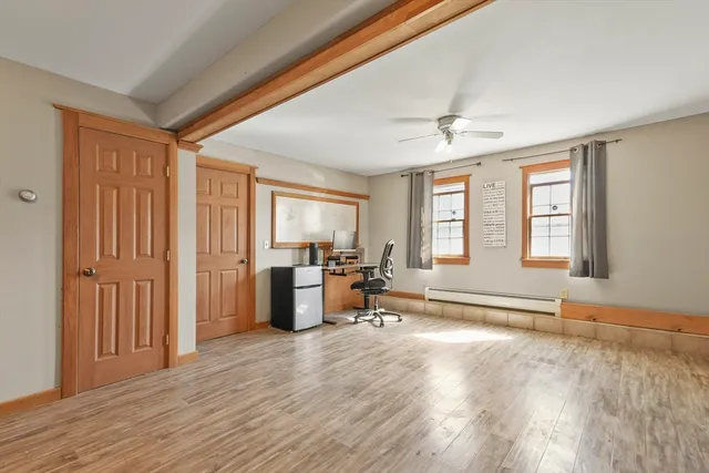 wooden floor and windows in a room with a window