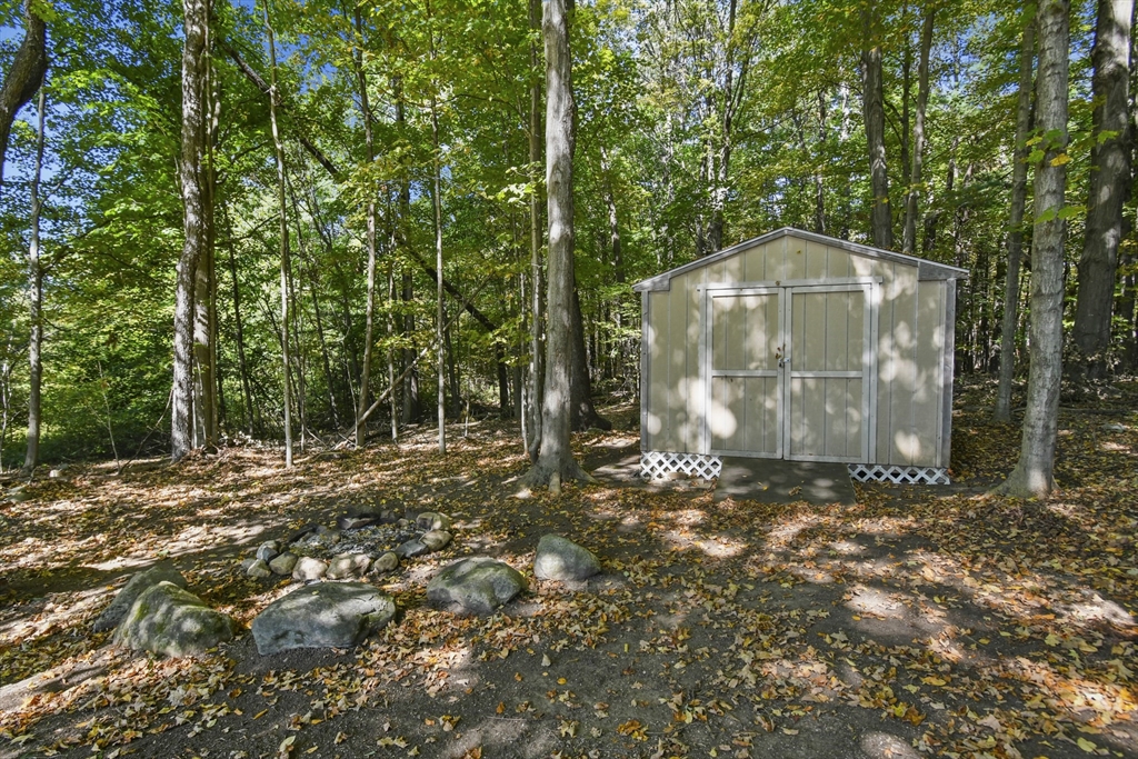 29 Murphy Place Pittsfield, MA 01201 - Photo 23 of 26 a view of a tiny house with a trees