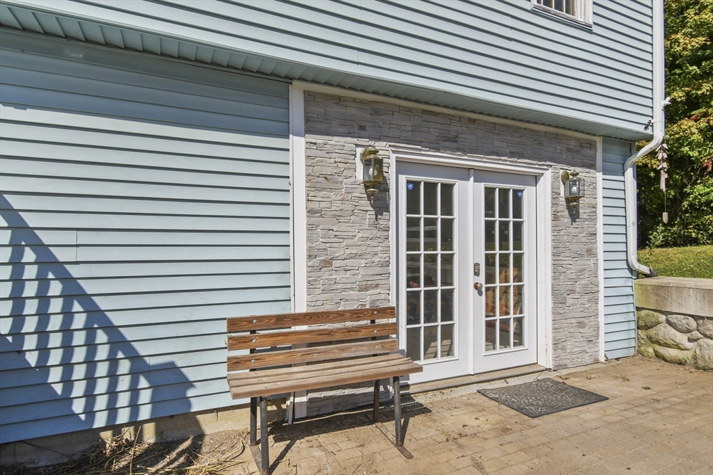 29 Murphy Place Pittsfield, MA 01201 - Photo 5 of 26 a front view of a house with a garden