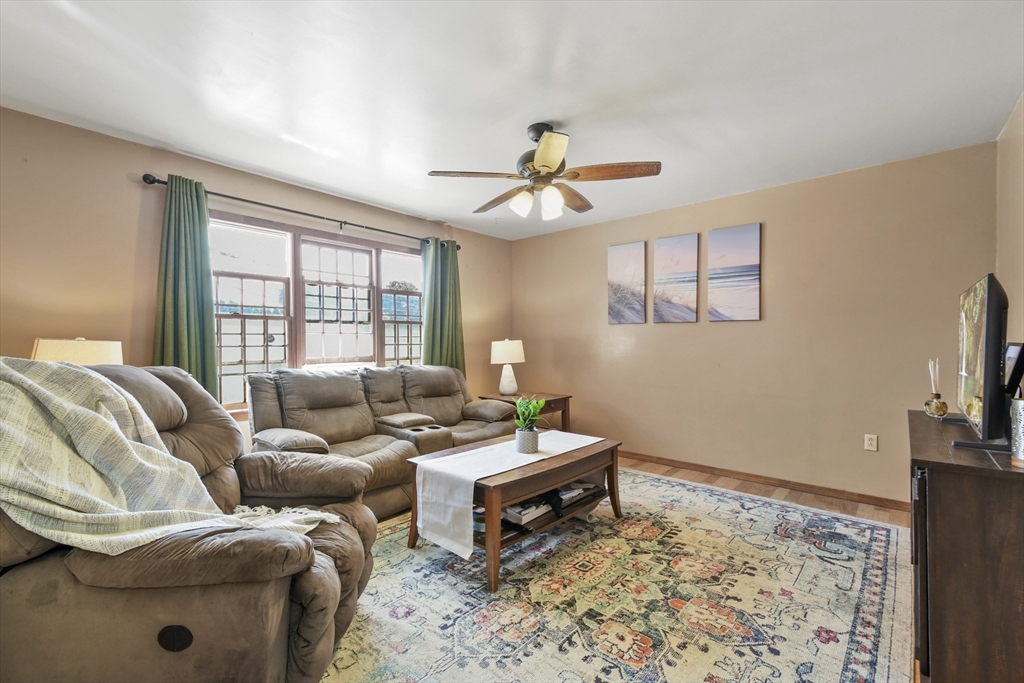 29 Murphy Place Pittsfield, MA 01201 - Photo 9 of 26 a living room with furniture and a flat screen tv