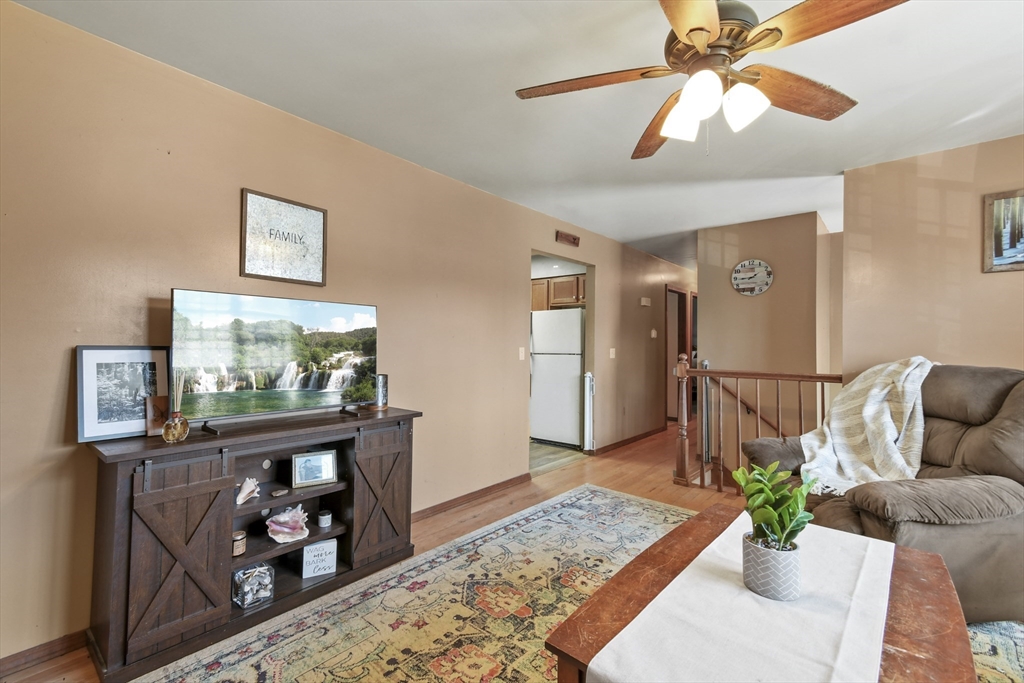 29 Murphy Place Pittsfield, MA 01201 - Photo 10 of 26 a living room with furniture and a flat screen tv