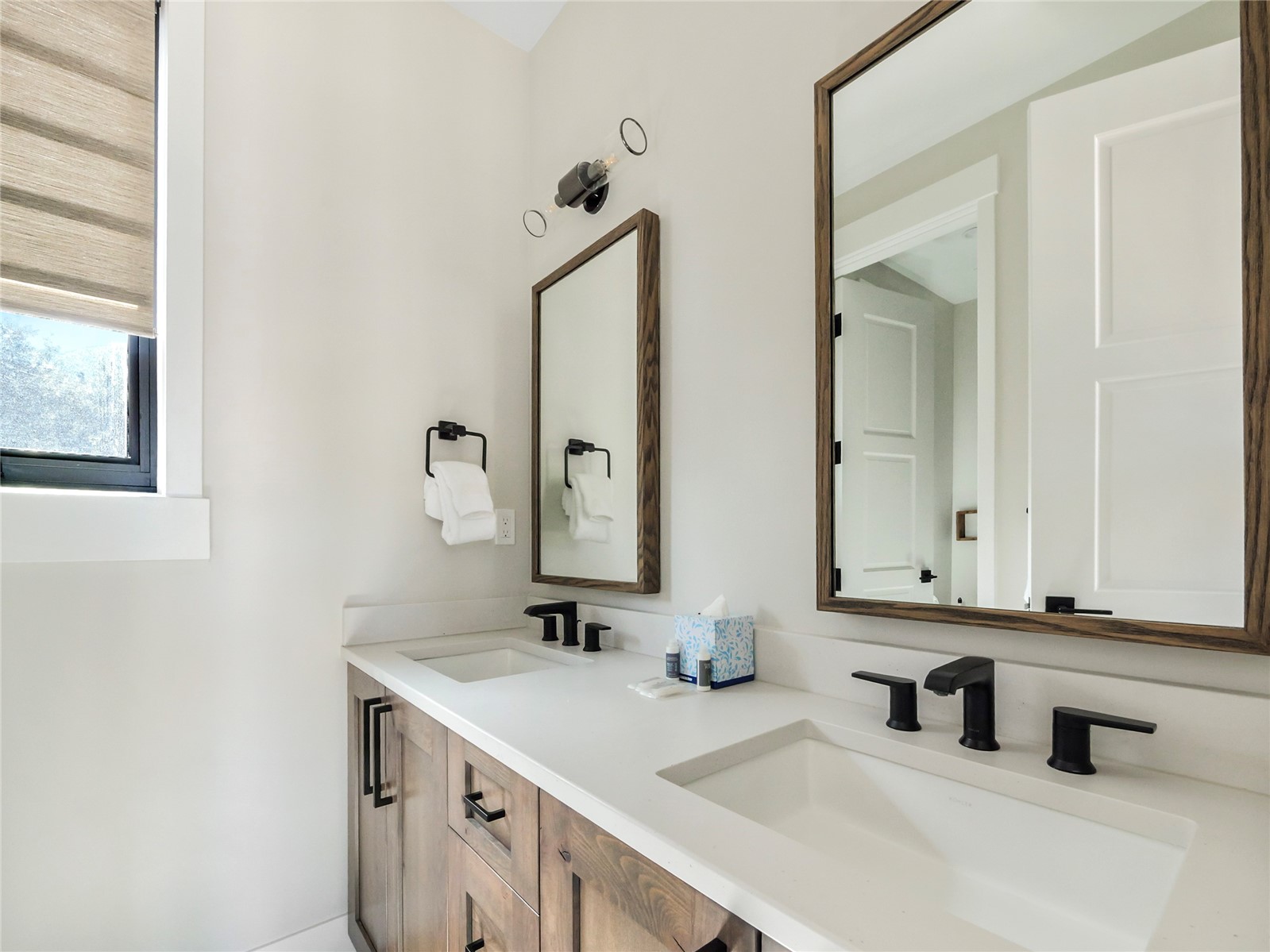 75 Alcove Court, Unit 75 Keystone, CO 80435 - Photo 15 of 40 a bathroom with double vanity sink and a mirror