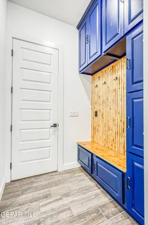 a view of a room with storage and utility room