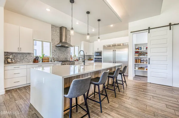 a view of a hallway with entryway door
