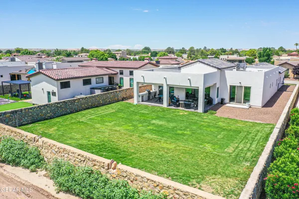 a bathroom with a sink toilet and mirror