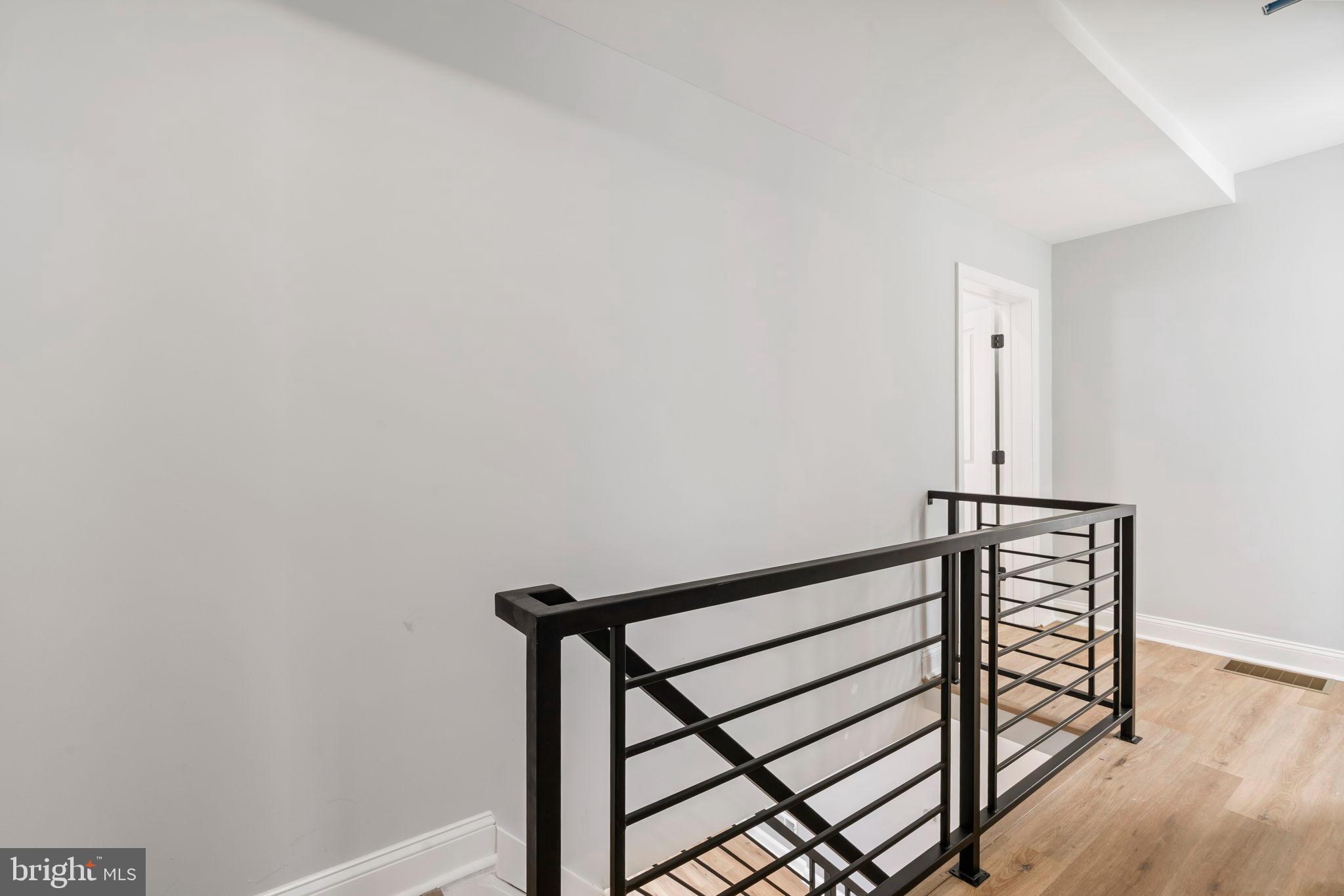 3464 Division Street Philadelphia, PA 19129 - Photo 19 of 40 a view of entryway with wooden floor